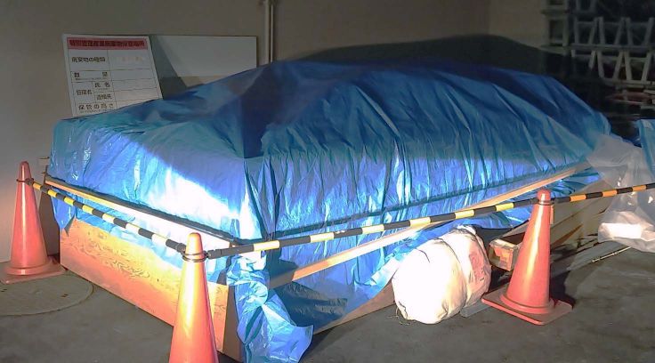 廃石綿の保管場所：周囲区画をしてシート養生の写真